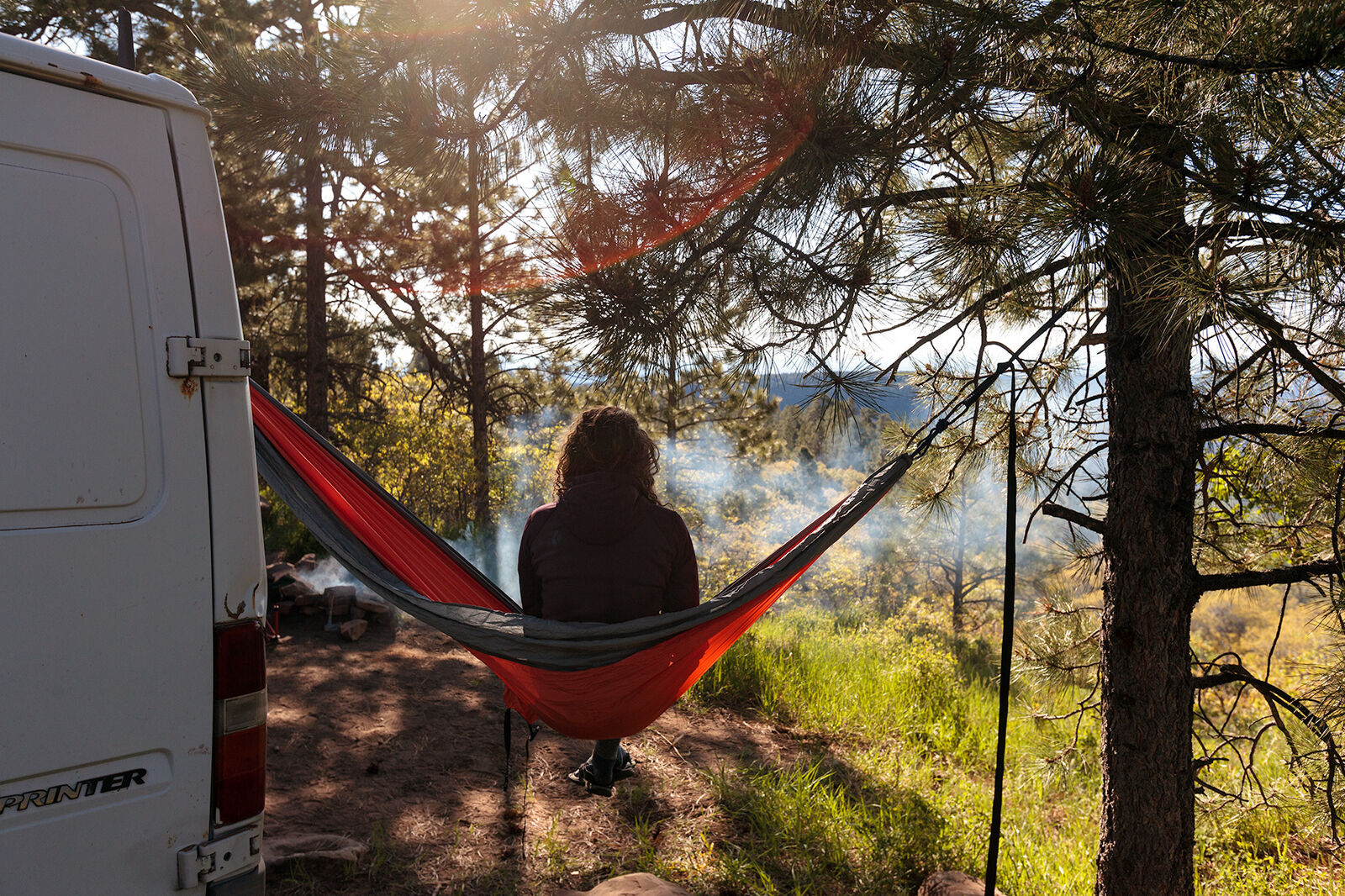 Lydia sitting in a hammock at a campsite in Bears Ears National Monument