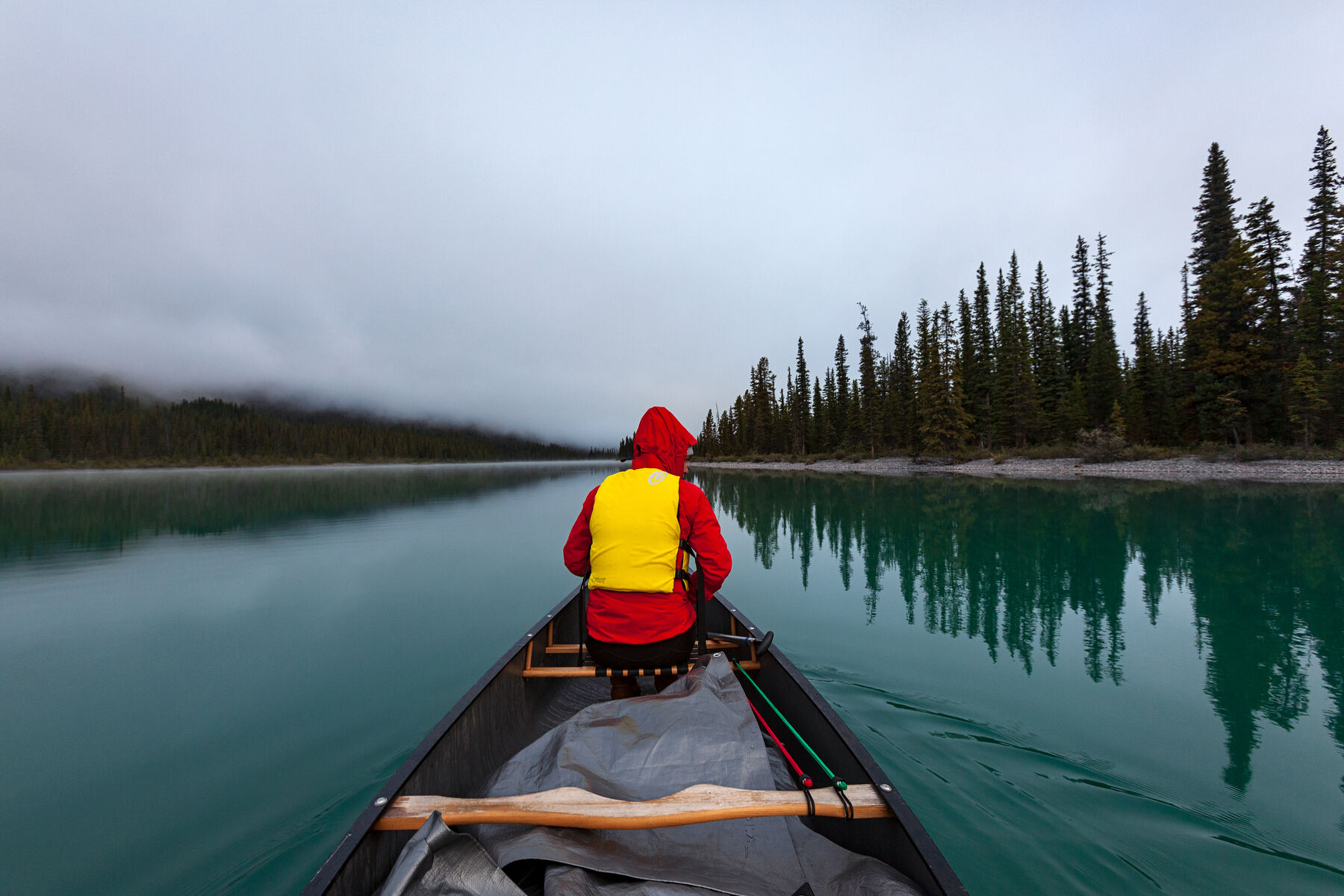 Lydia canoeing on Maligne Lake in Jasper National Park, Alberta Canada