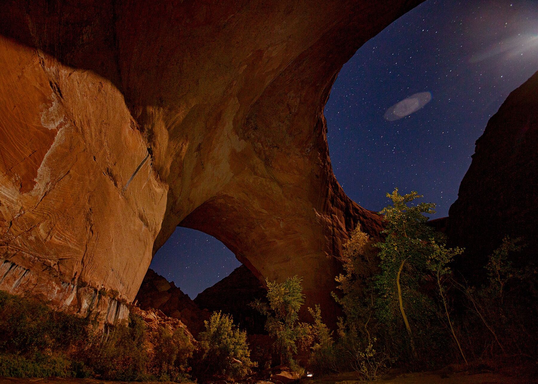 Coyote Arch lit by moonlight in Grand Staircase Escalante National Monument