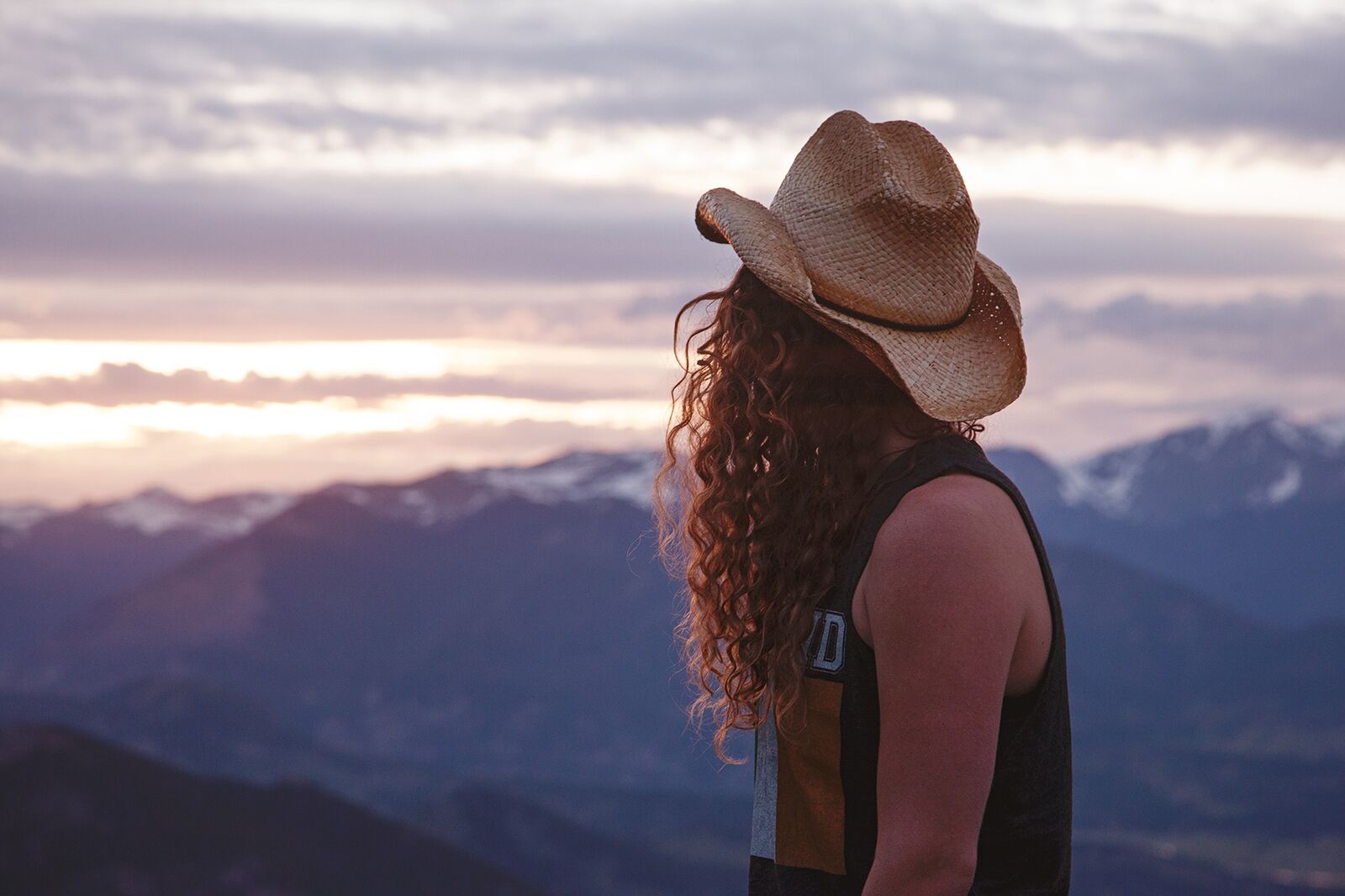 Lydia watches the sunset over the Rocky Mountains in Colorado