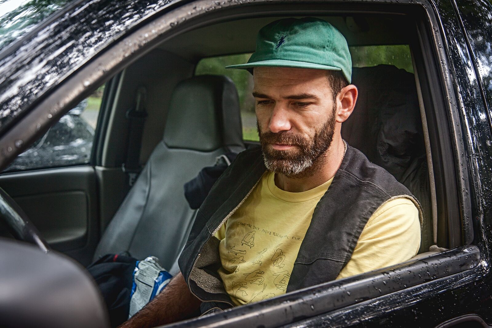 Dusty looks contemplative in his car