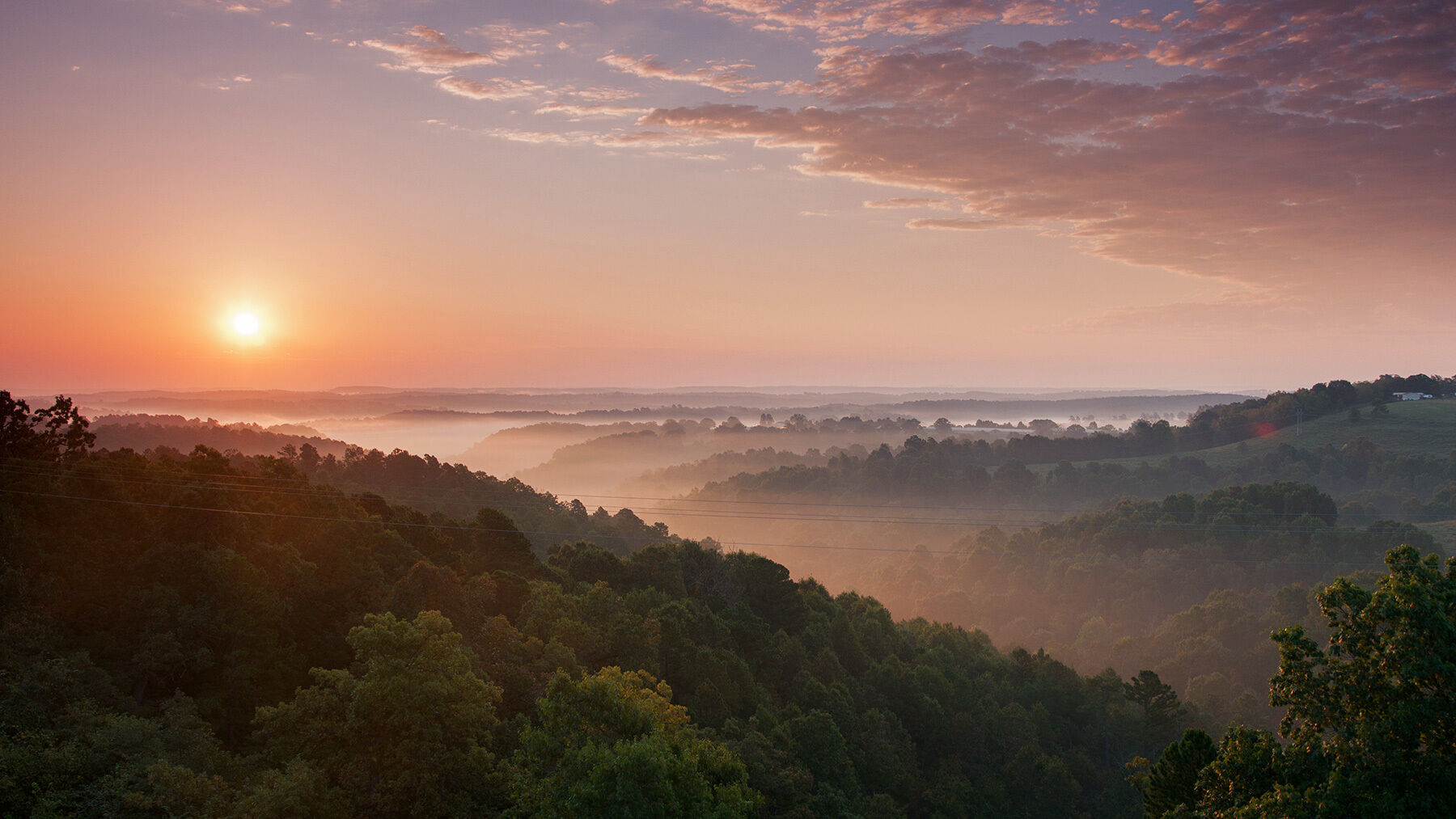 A beautiful sunrise over the hills of the Ozarks in Arkansas