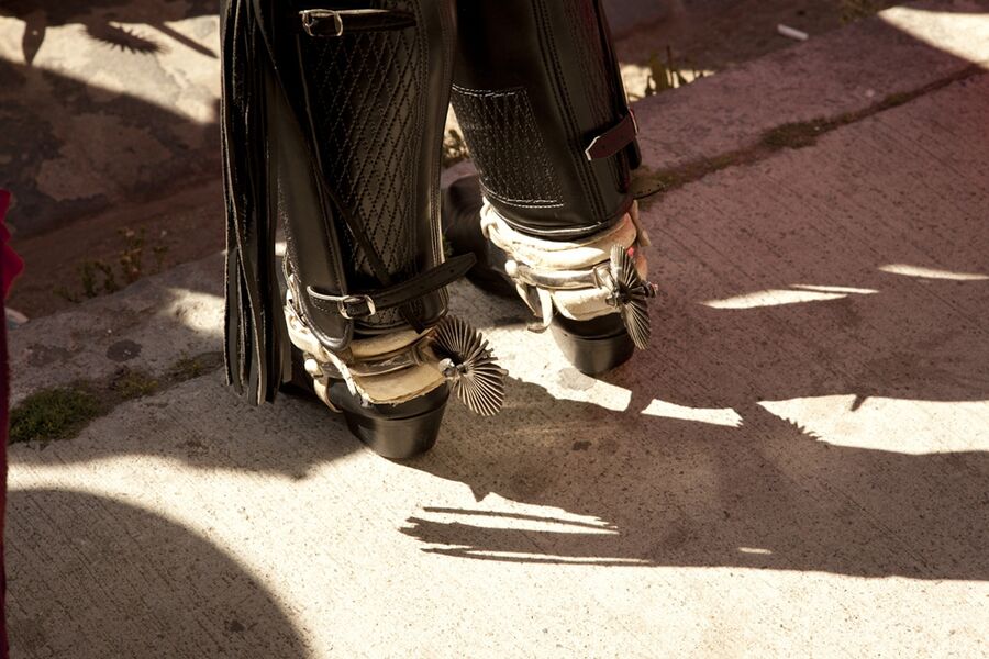 Spurs on a man in traditional Chilean attire during Fiestas Patrias in Valparaíso, Chile