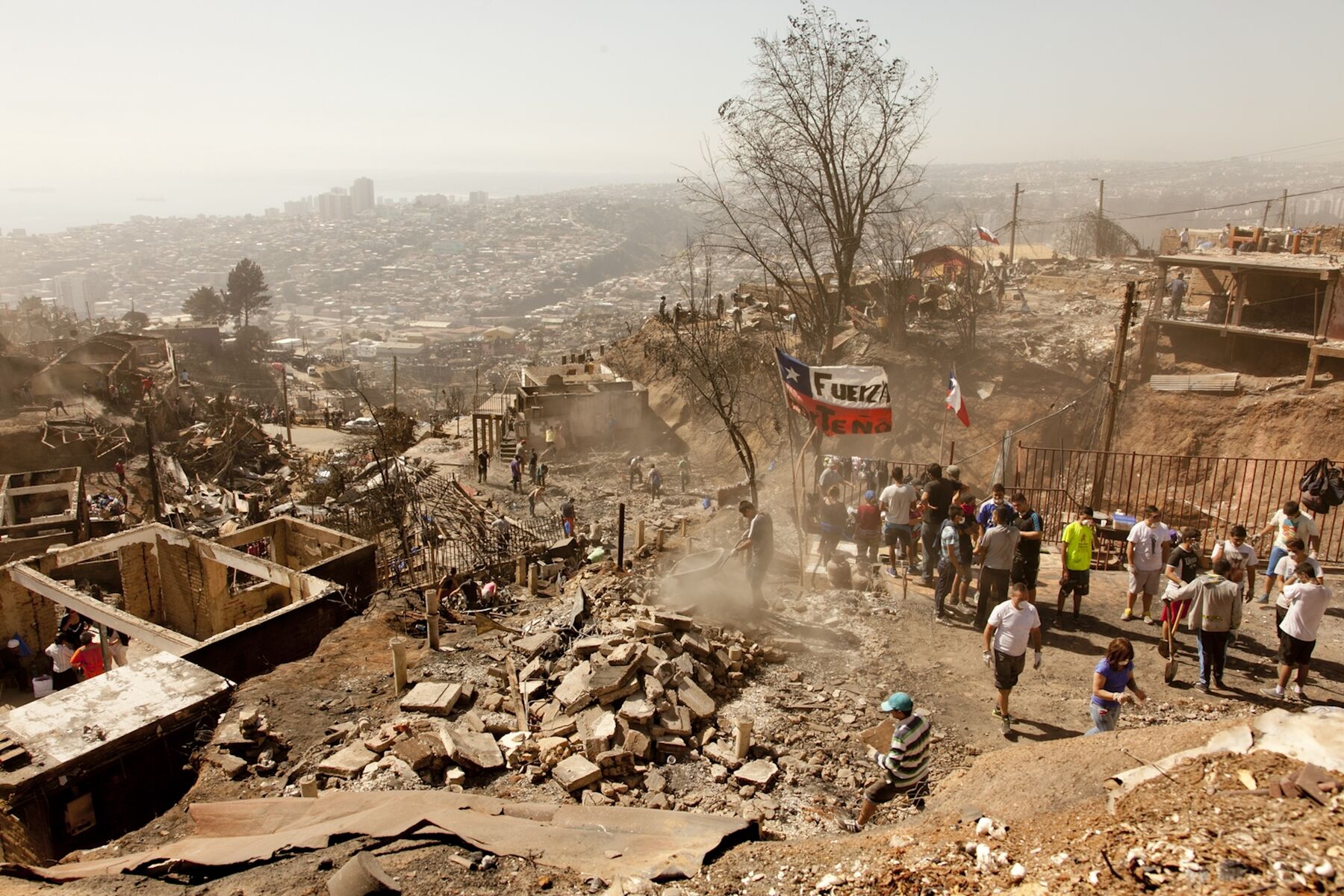 People help in the aftermath of a terrible fire