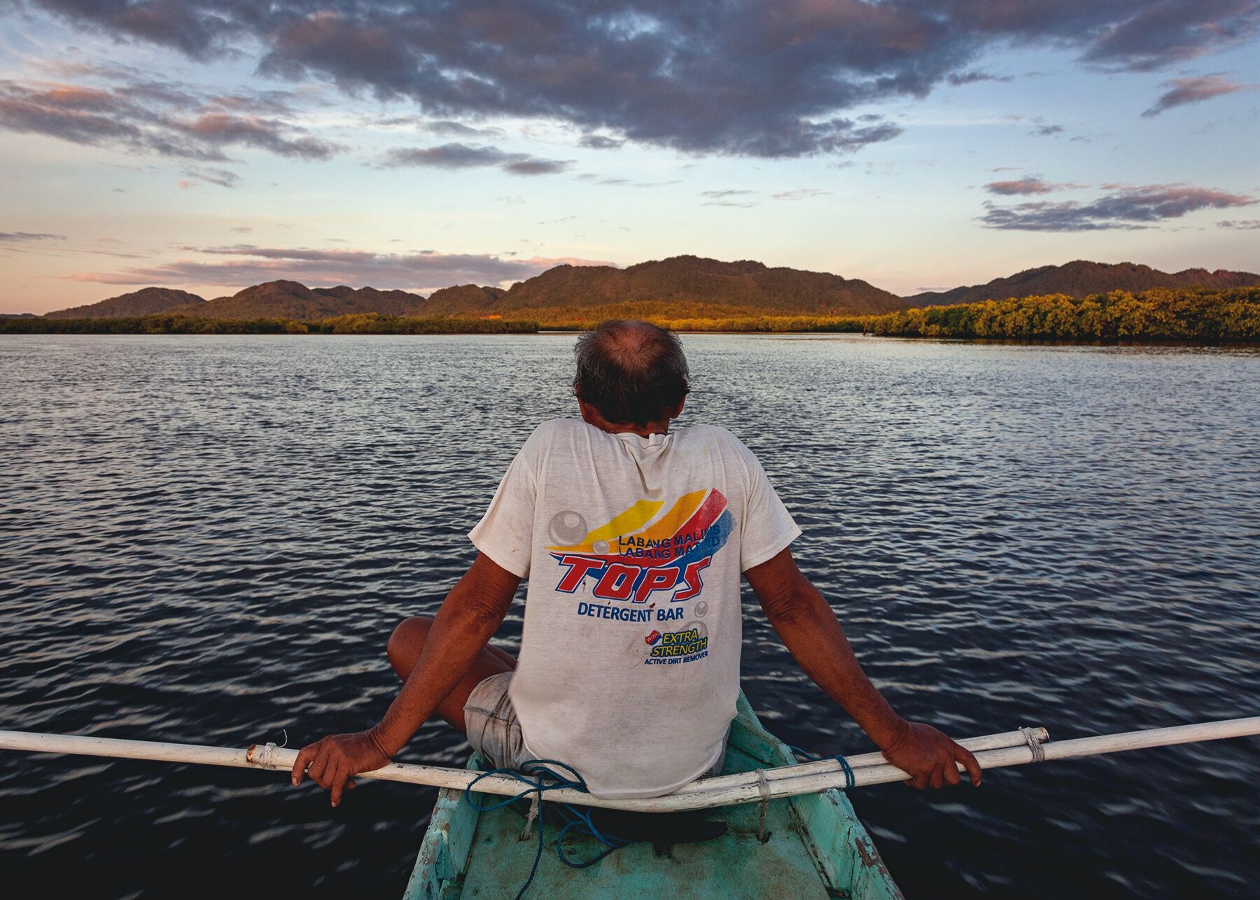 Man on a bangka boat in Siargao, Philippines